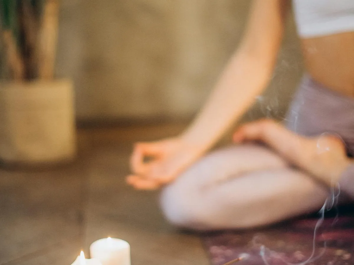 Small group seated in a calm studio for guided relaxation