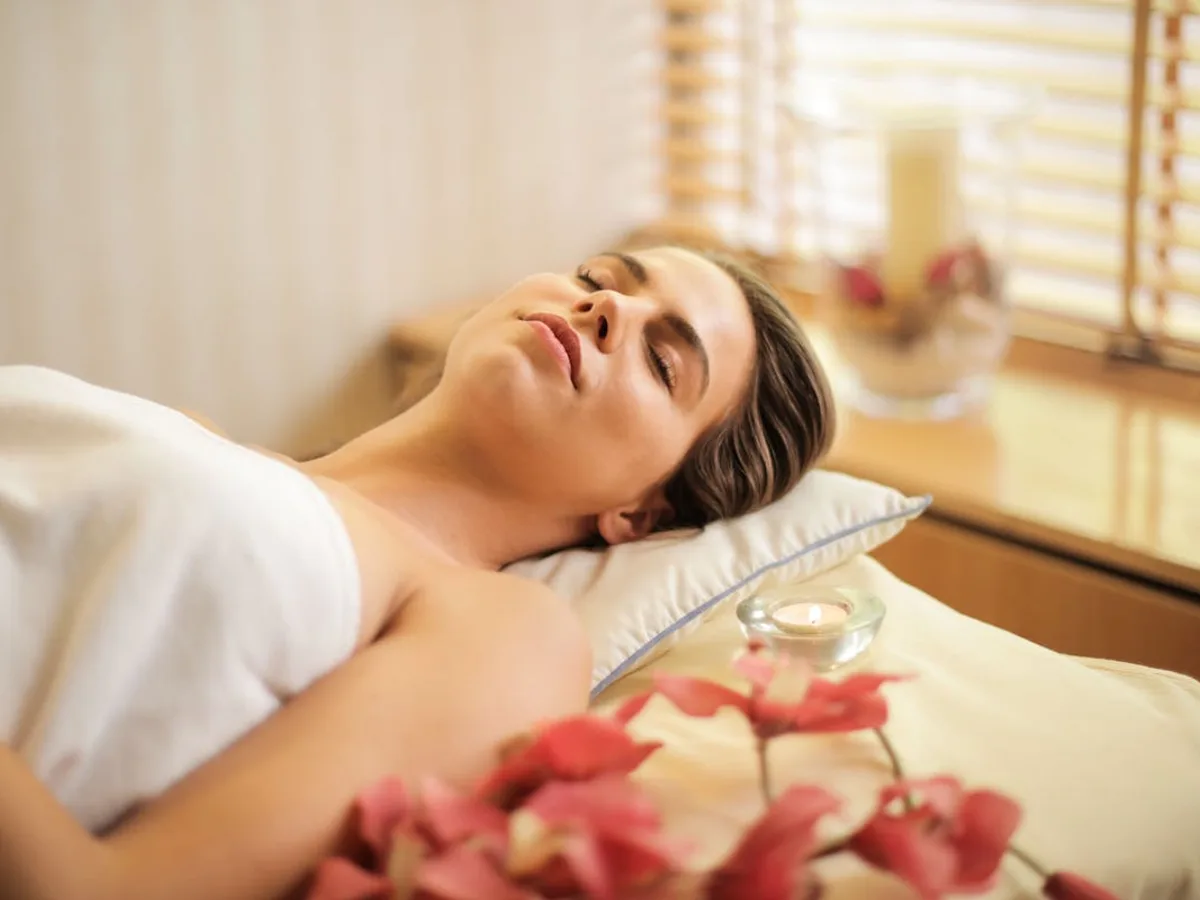 Deep tissue massage focusing on shoulders in a calm room